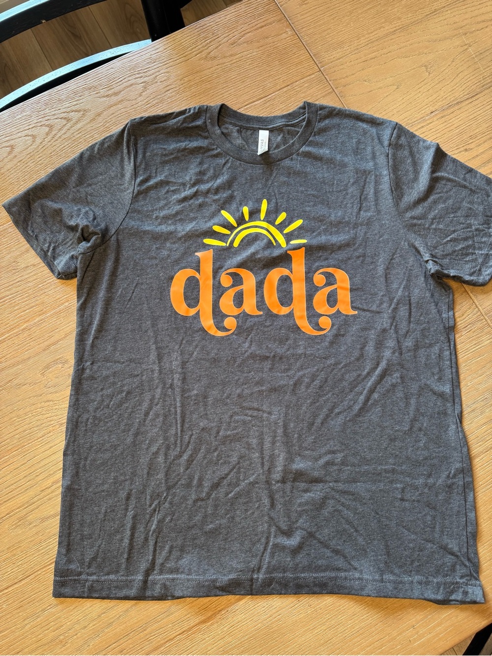 Bella Canvas Charcoal Tee with Orange 'dada' Print and Yellow Sun